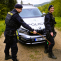 Policisté v přírodě s vozem.png