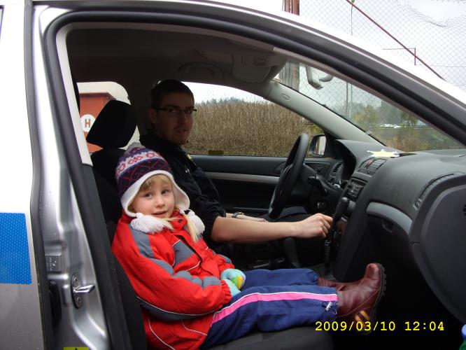 Policejní auto na závěr